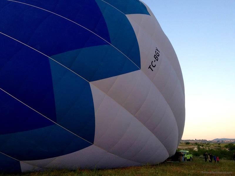 Dwarfed by Butterfly's balloon Hot air balloon dwarfs kids and truck Butterfly Balloons Goreme