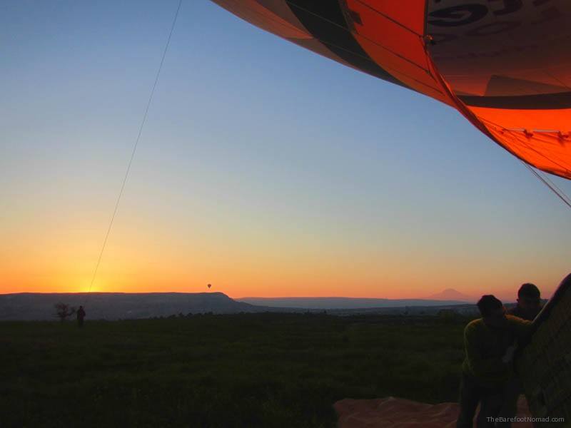 Setting the basket upright Setting the hot air balloon basket upright at sunrise Goreme Butterfly Balloons