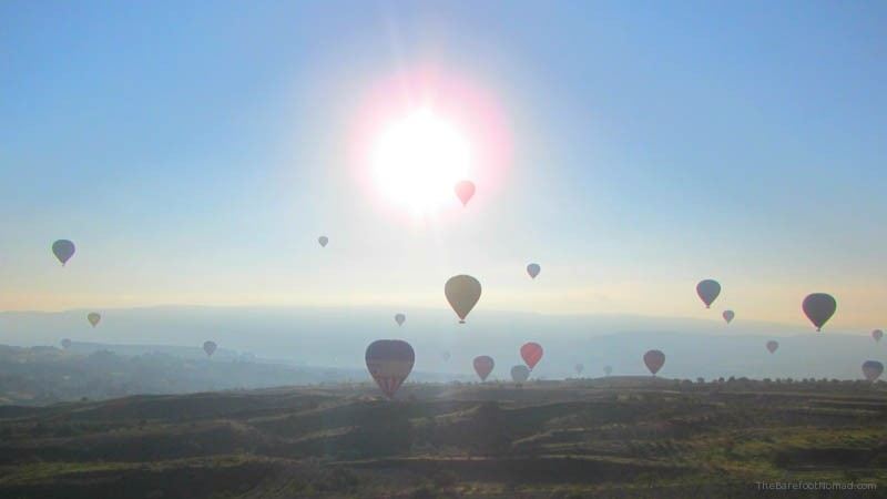 Rising sun over Goreme Balloons in the rising sun over Goreme Hot air balloon ride
